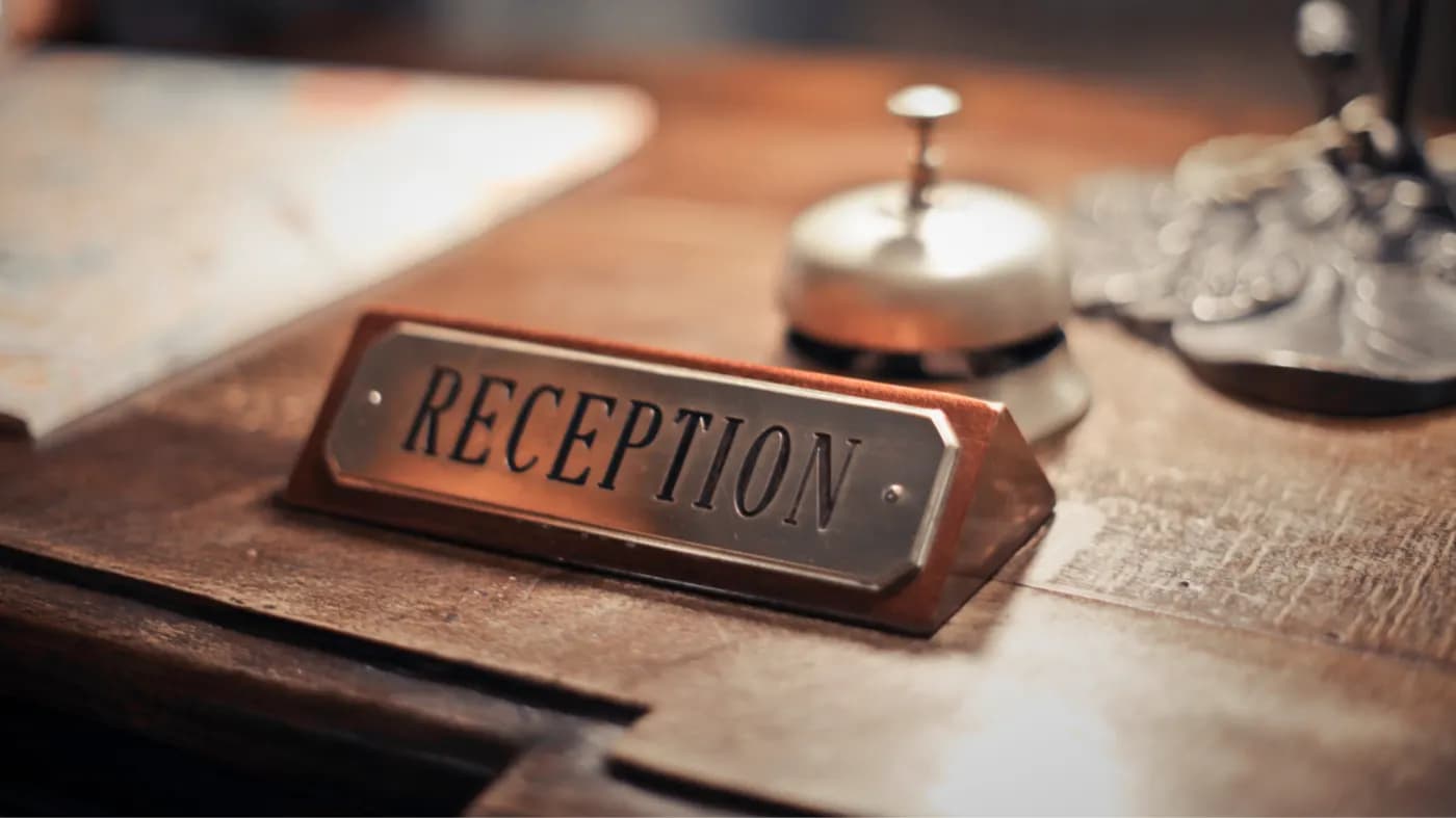 AT THE HOTEL / AT THE RECEPTION DESK